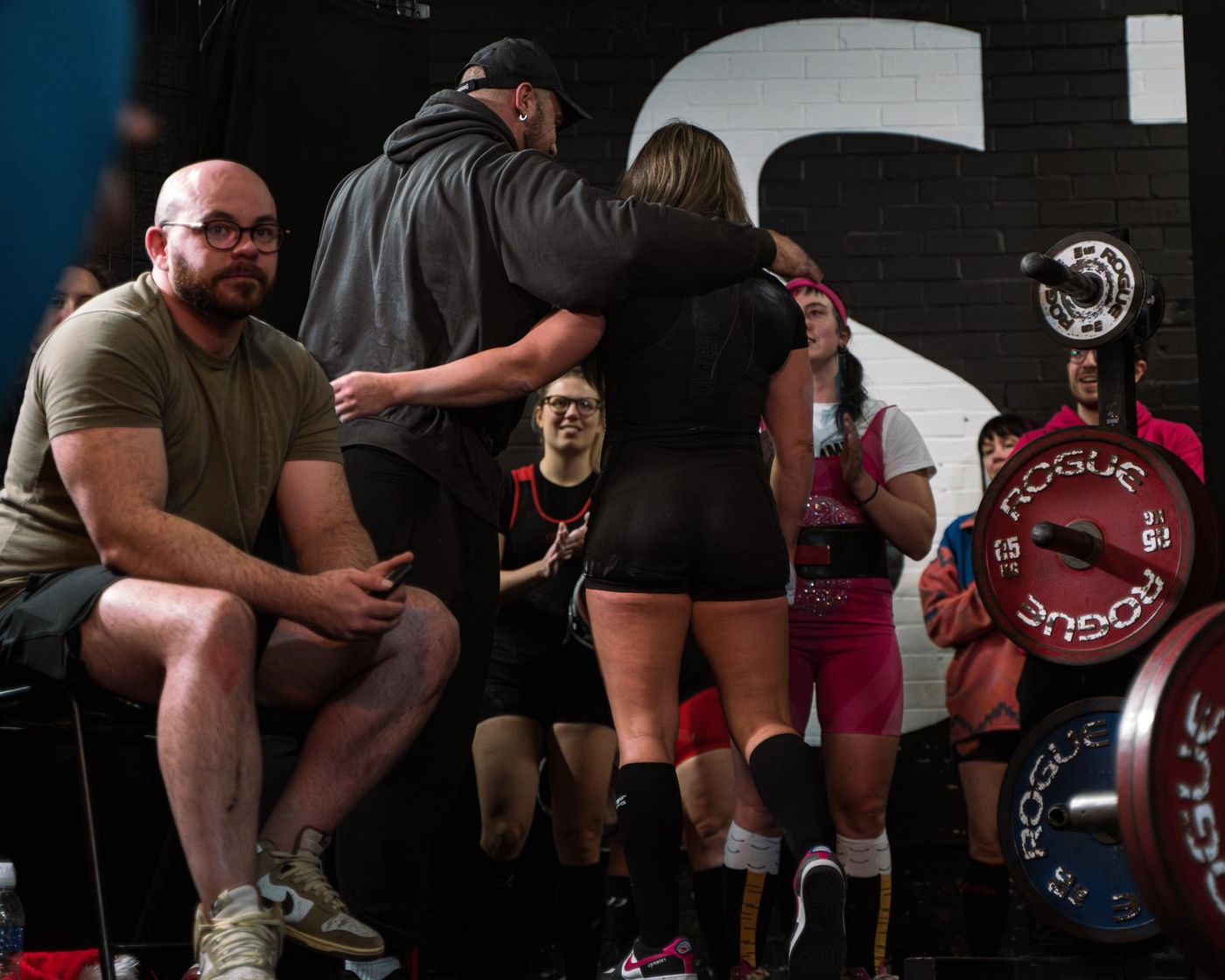 Ben congratulating an athlete after a lift